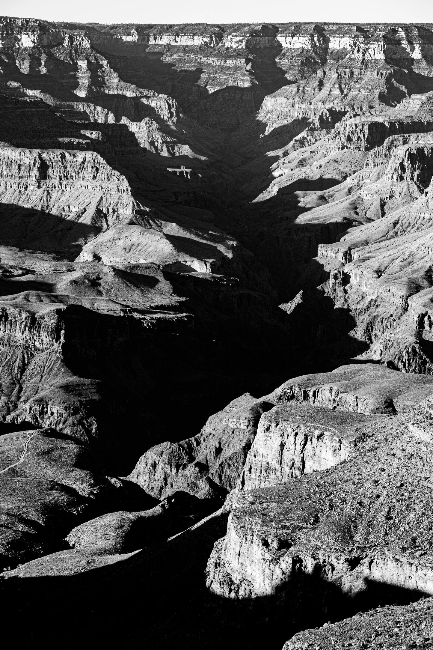 Vein of Shadow – Black and White Grand Canyon Vertical Print | High Contrast Canyon Light
