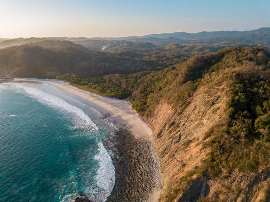 Pale Gold Barrigona Aerial Sunset Print | White Sand Beach & Blue Sea on the Nicoya Peninsula